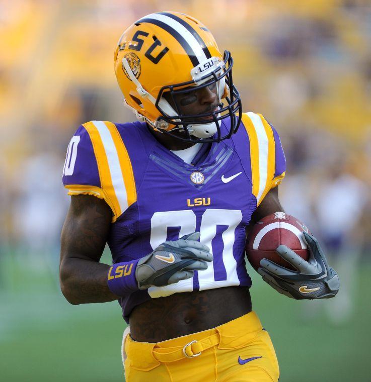 LSU junior wide receiver Jarvis Landry (80) runs drills before the Tigers' victory against Kent State on Saturday night, Sept. 14, 2013.