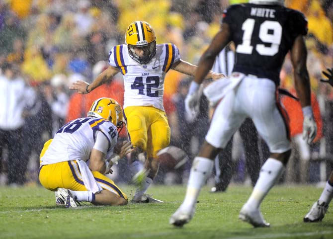 LSU freshman place-kicker Colby Delahoussaye (42) attempts to score a PAT Saturday, Sept. 21, 2013, during the Tigers' 35-21 victory against Auburn in Tiger Stadium.