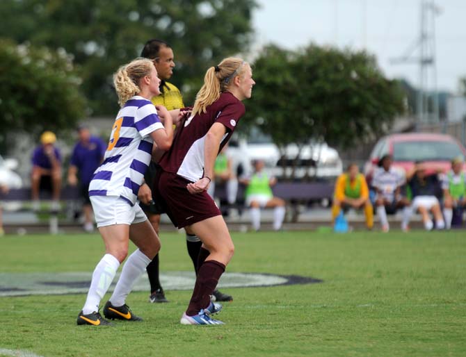 LSU freshman defender Megan Lee (13) and MSU freshman forward Annebel ten Broeke (9) stand ready Sunday, Sept. 29, 2013 during the tigers 3-2 victory against Mississippi State