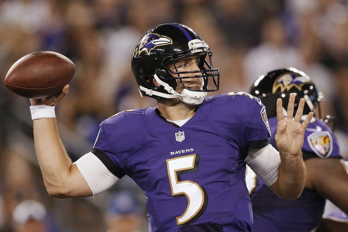 Baltimore Ravens quarterback Joe Flacco prepares to throw a pass during the first half of a preseason NFL football game against the Carolina Panthers in Baltimore, Thursday, Aug. 22, 2013. (AP Photo/Patrick Semansky)