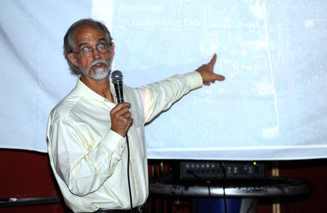 LSU Ernest and Alice Neal Professor of Geology, Jeffrey Nunn, speaks to fellow students and Baton Rouge locals Tuesday, Sept. 24, 2013 at Chelsea's Caf&#233; about the Louisiana sinkhole and its expansions during the monthly LSU Science Caf&#233; talks.