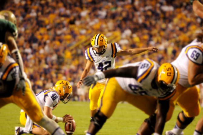 LSU freshman place kicker Colby Delahoussaye kicks an extra point field goal Sept. 7, 2013 during the 56-17 victory against UAB in Tiger Stadium.