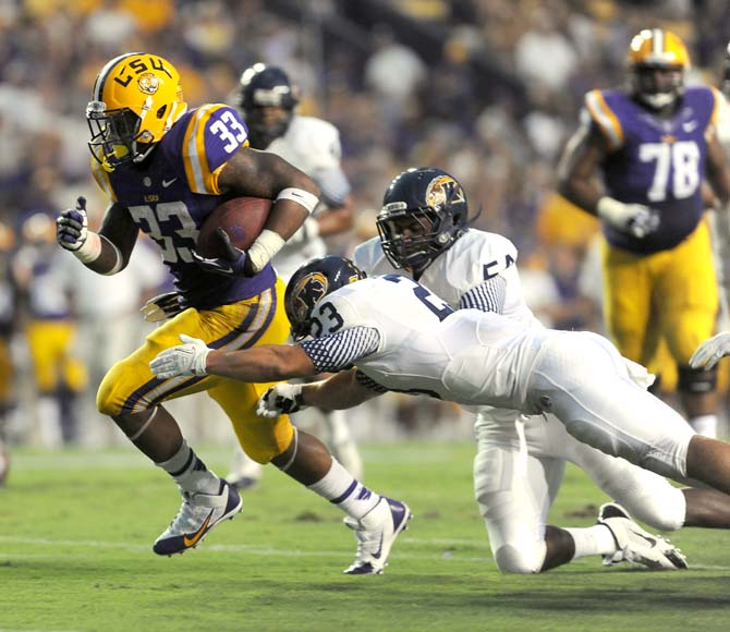 LSU sophomore running back Jeremy Hill scores a touchdown Saturday, Sept. 14, 2013 during the Tiger's 45-13 victory in Tiger Stadium