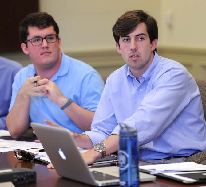 Student Government President John Woodard discusses the student technology fee Sept. 16, 2013, at a meeting in Thomas D. Boyd Hall.