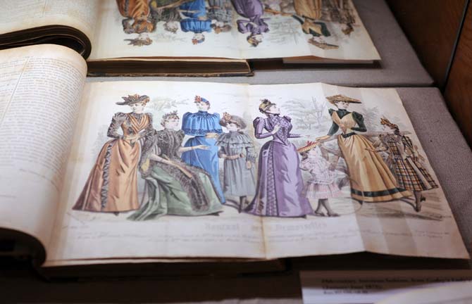 An image of women's fashion from the 1800s is on display Wednesday, October 2, 2013, as part of the Centuries of Style: A Retrospective of Dress exhibit at Hill Memorial Library.