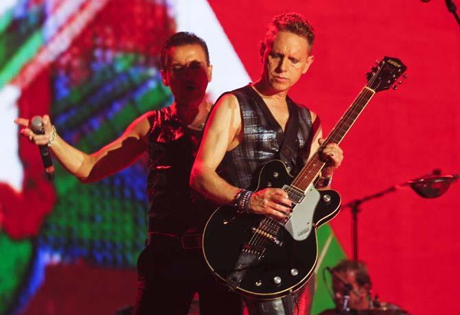 Depeche Mode's Martin Gore, right, and Dave Gahan perform on Day 4 of the 2013 Austin City Limits Music Festival at Zilker Park on Friday, Oct. 11, 2013 in Austin, Texas. (Photo by Jack Plunkett/Invision/AP)