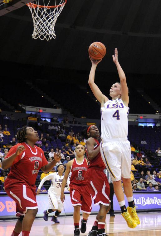 LSU sophomore guard Anne Pedersen (4) lays up the ball Wednesday, Oct. 30, 2013 during the Lady Tiger's 95-24 victory agianst Tennessee Temple in the PMAC.