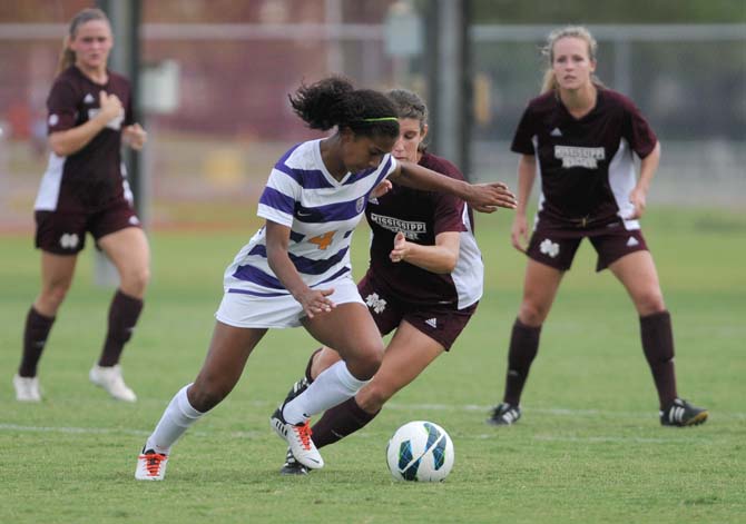 LSU freshman forward Summer Clarke maneuvers past a defender during LSU's match against Mississippi State on September 29, 2013.