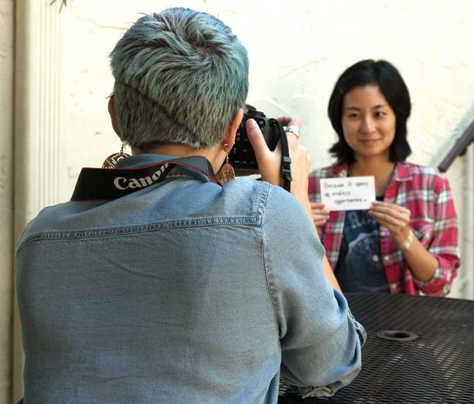 LSU phsycology junior Courtney Brandabur takes a picture of Shoko Morikawa Wednesday, Oct. 9, 2013 for her opinoin on feminsism for her upcoming documentary on equality when it comes to education around the world.