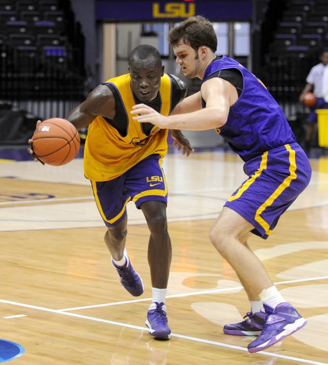 LSU junior transferJohn Odo (31) drives toward the basket during practice Tuesday, Oct. 1, 2013 in the PMAC.