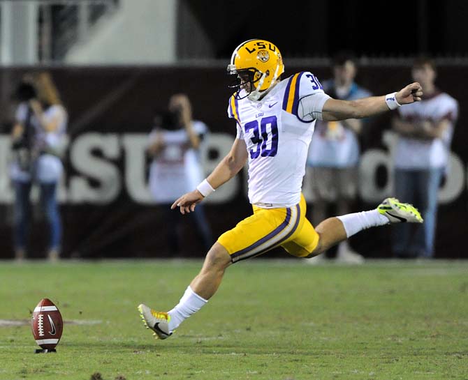 LSU junior kicker James Hairston (30) punts the ball on Saturday Oct. 5, 2013 during the 59-26 victory against Mississippi State in Davis Wade Stadium.