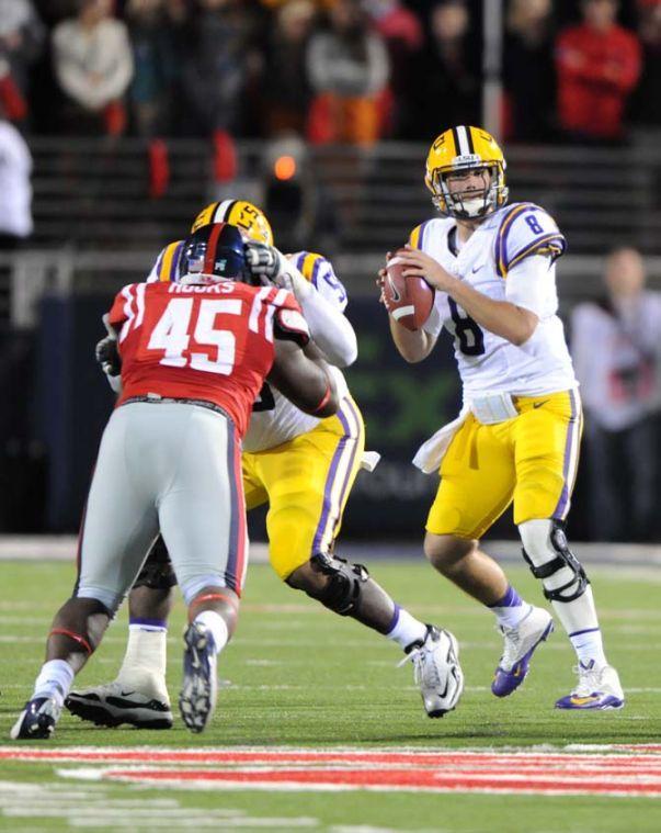 LSU senior quarterback Zach Mettenberger (8) sets up to pass the ball Saturday, October 19, 2013 during the Tigers' 27-24 loss against Ole Miss at Vaught-Hemingway Stadium.