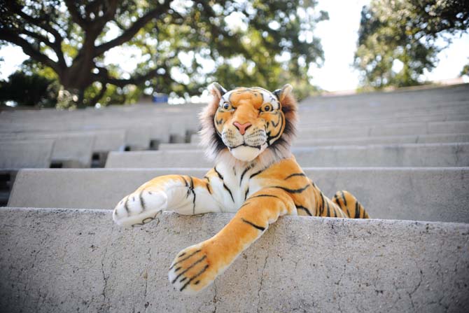 Inspired by Unagi Travels, a stuffed tiger is photographed Monday, Oct. 28, 2013 lounging in the LSU Greek Theater.