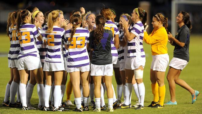 The LSU soccer team cheers Friday, Oct. 11, 2013 before the 1-0 victory against Mizzou at the LSU Soccer Stadium.