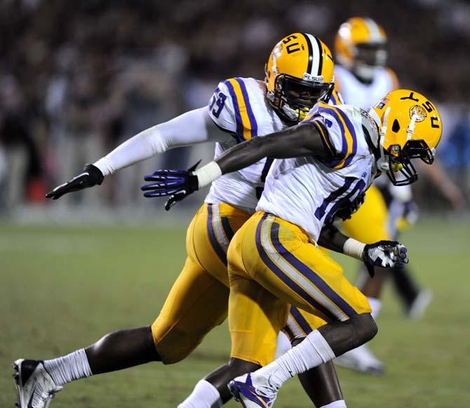 LSU junior defense Jermauria Rasco (59) congratulates freshman defensive back Tre'Davious White (16) on Saturday Oct. 5, 2013 during the 59-26 victory against Mississippi State in Davis Wade Stadium.