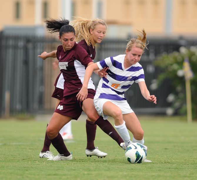 LSU freshman midfielder Emma Fletcher (8) steals the ball Sunday, Sept. 29.13 during the tiger's 3-2 victory against Mississippi State.