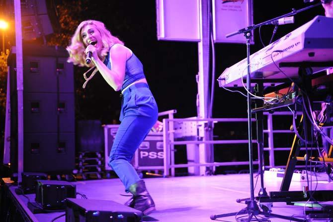 Amy Renee Heidemann, of Karmin, performs Thursday, Oct. 24 2013, at the LSU Homecoming Concert held at the parade grounds