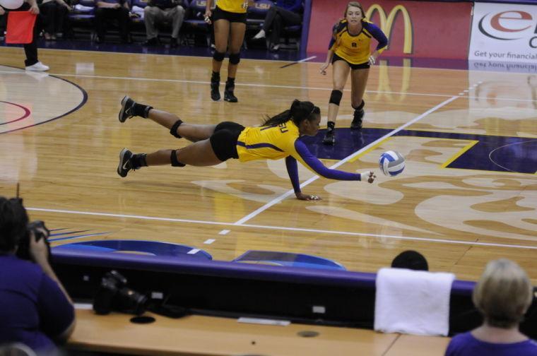 LSU sophomore middle blocker Khourtni Fears attempts a dig Saturday during LSU's match with No. 4 Texas.