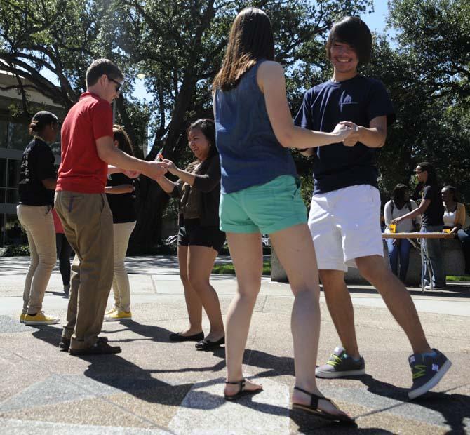 The Hispanic Student Cultural Society promotes Hispanic Heritage Month by offering Salsa dance lessons Wednesday, Oct. 9, 2013, in the Echo Circle of Free Speech Alley.