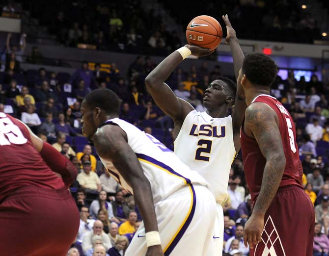 LSU junior forward Johnny O'Bryant III (2) prepares to make a free throw Saturday, Feb. 23, 2013 during the Tigers' 97-94 triple overtime victory against the Crimson Tide.