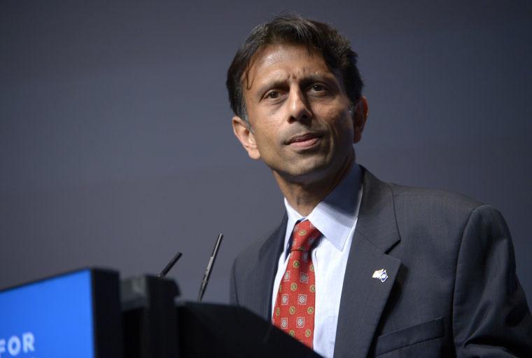 FILE - In this Aug. 30, 2013, file photo, Louisiana Gov. Bobby Jindal addresses attendees during the Americans for Prosperity Foundation's Defending the American Dream Summit in Orlando, Fla. With no end in sight to the federal government shutdown, Republican governors eyeing the 2016 presidential race are pitching themselves as can-do politicians and highlighting records of achievement. "Republican governors are not going to take it anymore," says Jindal, among those state leaders and potential presidential candidates using the shutdown to try to position themselves as outsiders at a time of voter disgust with Congress and anyone connected with Washington. (AP Photo/Phelan M. Ebenhack)