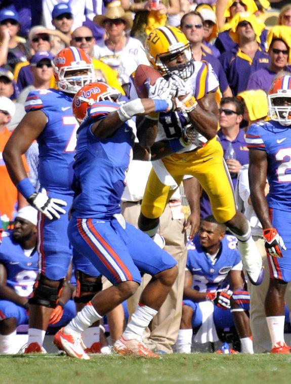 LSU junior wide receiver Jarvis Landry (80) catches a pass Saturday, Oct. 12, 2013 during the Tigers' 17-6 victory against the Gators in Tiger Stadium.