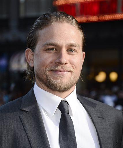 Actor Charlie Hunnam arrives on the red carpet at the season six premiere screening of the television series "Sons of Anarchy" at the Dolby Theatre on Saturday, Sept. 7, 2013 in Los Angeles. (Photo by Dan Steinberg/Invision/AP)