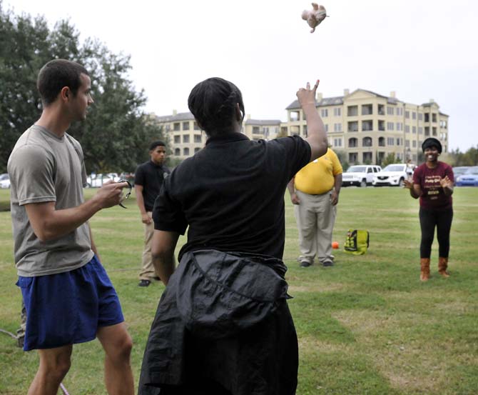 Staff from the LSU UREC and members of the LSU chapter of the Environmentors perform Ice Breakers with the students from the Environmentors program at Scotlandville High on Monday, Oct. 21, 2013, at the BREC Milford Wampold Memorial Park on Stanford Ave.