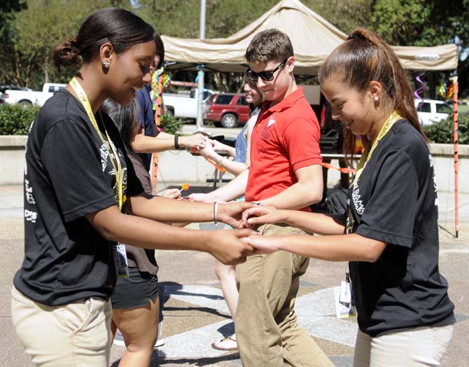 The Hispanic Student Cultural Society promotes Hispanic Heritage Month by offering Salsa dance lessons Wednesday, Oct. 9, 2013, in the Echo Circle of Free Speech Alley.