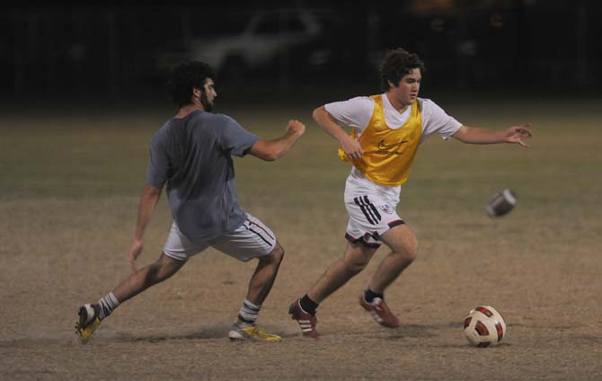 LSU agricultural business freshman Manuel Gutierrez scrimmages Tuesday, Oct. 29, 2013 at the UREC practice fields with the LSU men's soccer club.