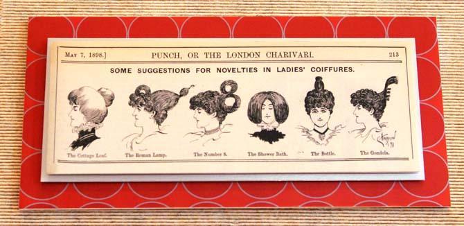 An image of women's hairstyles from 1898 is on display Wednesday, October 2, 2013, as part of the Centuries of Style: A Retrospective of Dress exhibit at Hill Memorial Library.