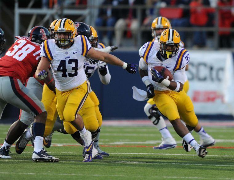 Sophomore running back Jeremy Hill (33) runs the ball Saturday, October 19, 2013 at Ole Miss.