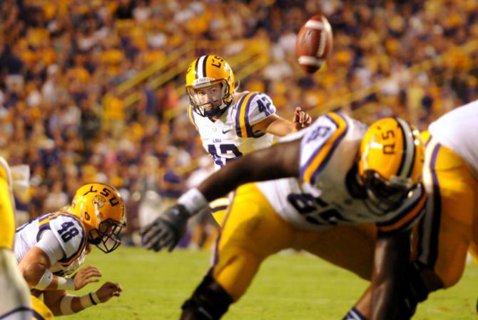 LSU freshman place kicker Colby Delahoussaye kicks an extra point field goal Sept. 7, 2013 during the 56-17 victory against UAB in Tiger Stadium.