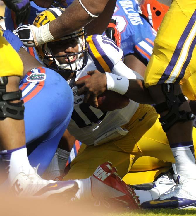 LSU freshman quarterback Anthony Jennings (10) pushes into the endzone Saturday, Oct. 12, 2013 during the Tigers' 17-6 victory against the Gators in Tiger Stadium.