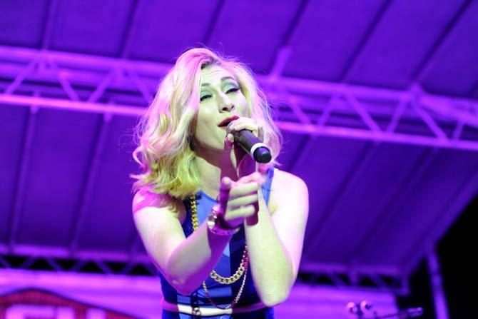 Amy Renee Heidemann, of Karmin, performs Thursday, Oct. 24 2013, at the LSU Homecoming Concert held at the parade grounds