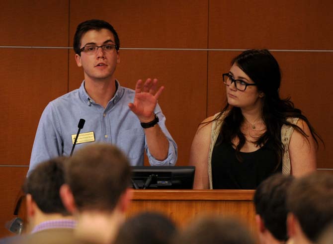 Speaker pro tempore Trey Schwartenzburg and Senator Kayleigh Buvens propose a resolution to bring to the Faculty Senate opposing the implementation of a suffix grading system at LSU on Wednesday, Oct. 9, 2013, in the Capitol Chambers Room.