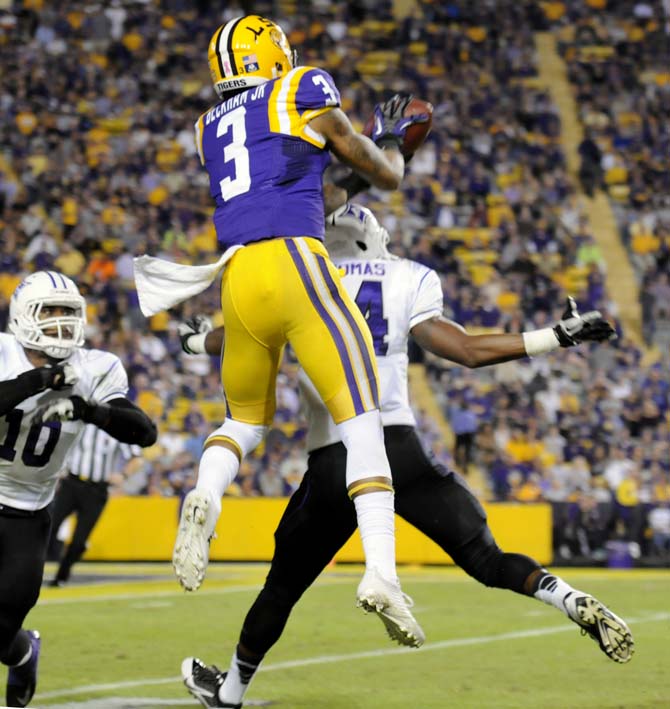 LSU junior wide reciever Odell Beckham Jr. (3) takes flight to capture a pass Saturday, Oct. 26, 2013, during the Tigers' 48-16 win against Furman in Tiger Stadium.