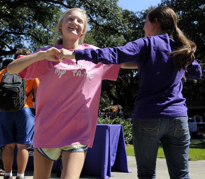 The Hispanic Student Cultural Society promotes Hispanic Heritage Month by offering Salsa dance lessons Wednesday, Oct. 9, 2013, in the Echo Circle of Free Speech Alley.