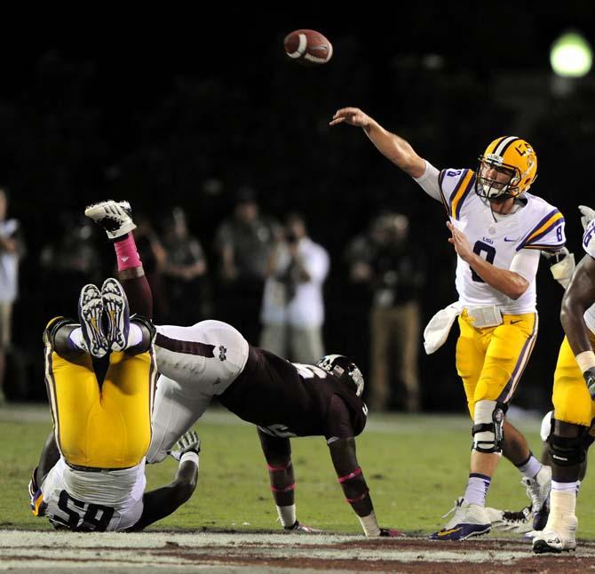 LSU senior quarterback Zach Mettenberger (8) makes a pass on Saturday October 5, 2013 during the 59-26 victory against Mississippi State in Davis Wade Stadium.