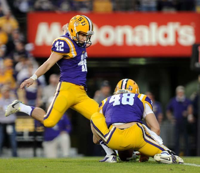 LSU freshman placekicker Colby Delahoussaye (42) kicks a field goal Saturday, Oct. 26, 2013, during the Tigers' 48-16 win against Furman in Tiger Stadium.