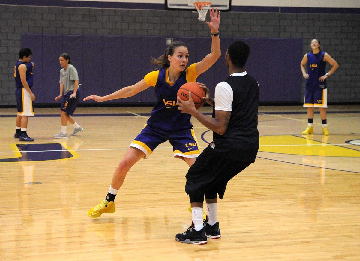 Sophomore guard Anne Pedersen runs defense drills Tuesday afternoon, Oct. 1, 2013 in the LSU Basketball Practice Facility.