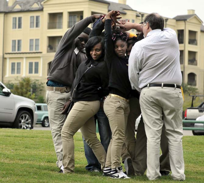 Staff from the LSU UREC and members of the LSU chapter of the Environmentors perform Ice Breakers with the students from the Environmentors program at Scotlandville High on Monday, Oct. 21, 2013, at the BREC Milford Wampold Memorial Park on Stanford Ave.