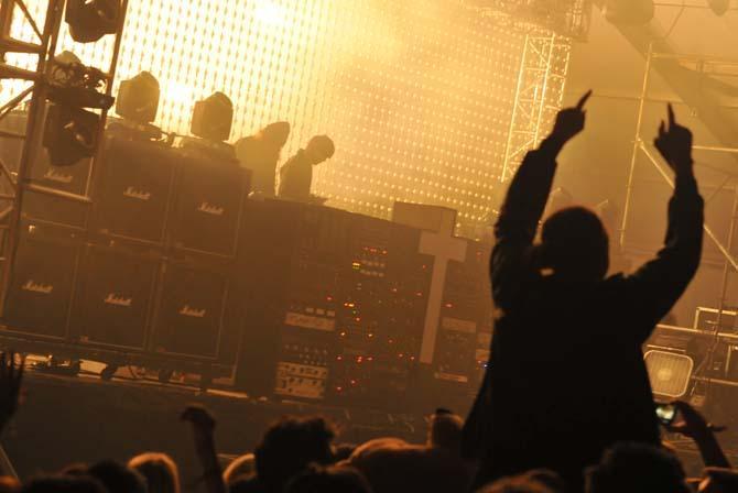 A crowd member dances to a song by Justice, a French electronic group, at Voodoo Fest in New Orleans.