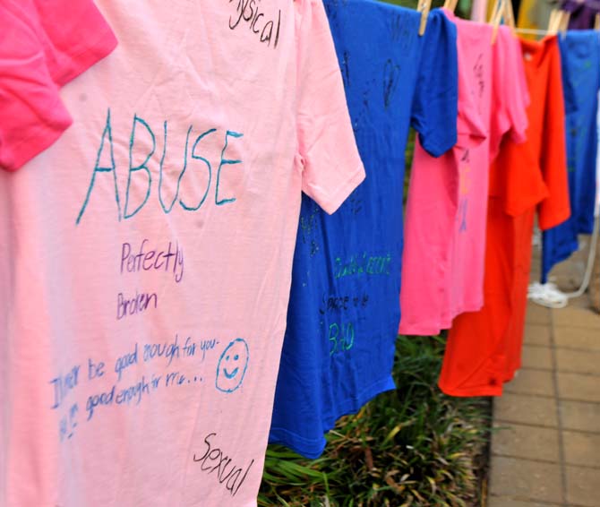 Baton Rouge Residents gathered on Sunday, Oct. 14, 2012, in front of the Memorial Tower for "Take Back the Night." Residents created t-shirts for the "Clothesline Project" as a way to help bear witness to violence against women.