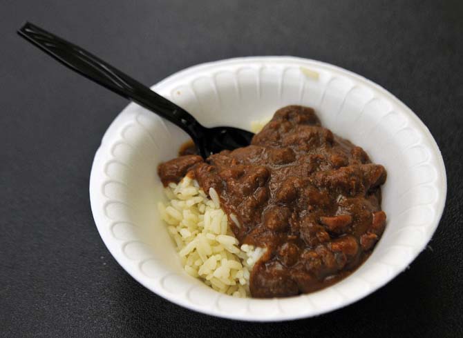 LSU students and families from around Baton Rouge were randomly selected to live like an middle class person at the 2013 Oxfam Hunger Banquet Wednesday, Oct. 23, 2013 in the Student Union. The middle class was served red beans and rice as their meal.