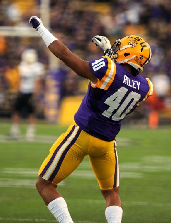 LSU freshman linebacker Duke Riley (40) does a pregame dance Saturday, Oct. 26, 2013, during the Tigers' 48-16 win against Furman in Tiger Stadium.