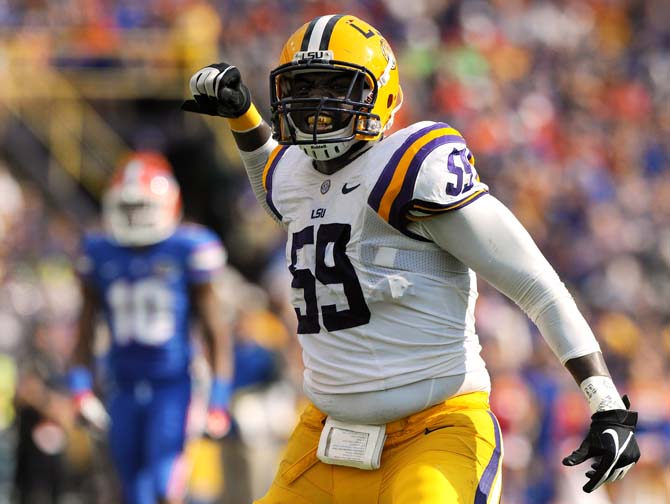 LSU junior defensive end Jermauria Rasco (59) celebrates after a play Saturday, October 12, 2013 during the Tigers' 17-6 victory against Florida in Tiger Stadium.