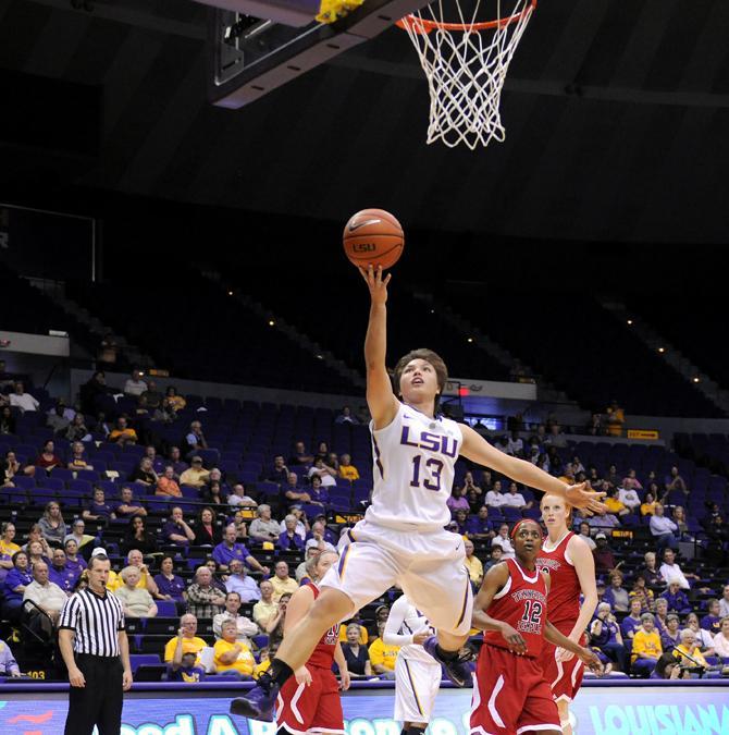 LSU freshman guard Rina Hill (13) lays up the basketball during the Lady Tiger's 95-24 victory against Tennessee Temple in the PMAC.