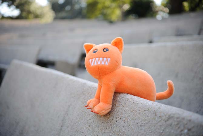 Inspired by Unagi Travels, a stuffed Haloween cat is photographed Monday, Oct. 28, 2013 lounging in the LSU Greek Theater.