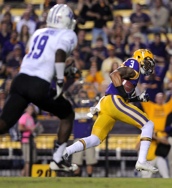 LSU junior wide reciever Odell Beckham Jr. (3) sprints towards the endzone Saturday, Oct. 26, 2013, during the Tigers' 48-16 win against Furman in Tiger Stadium.